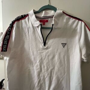 GUESS White Polo with Red and Black Trim. Does have 2 holes by thr tags